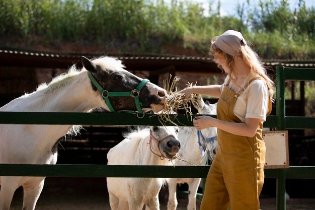 medium-shot-woman-feeding-animals_23-2149059787.jpg