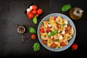 pasta-colored-farfalle-salad-with-tomatoes-mozzarella-basil_2829-14368.jpg